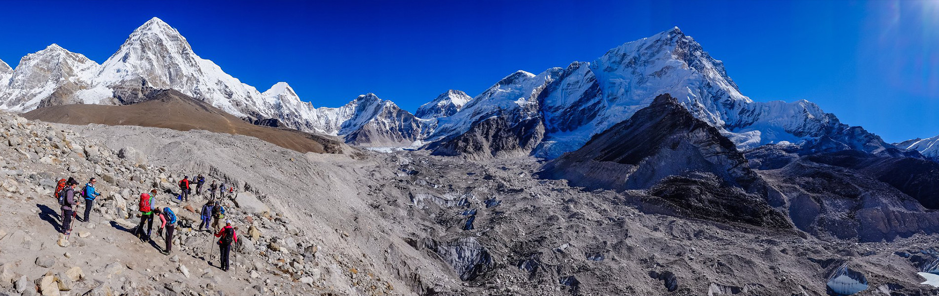 hikers on the trail towards gorakshep on the Everest Base Camp trek